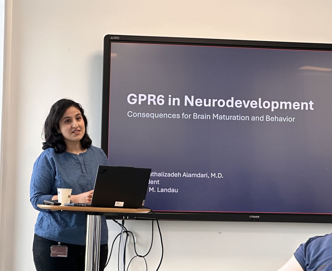 Arezou Fathalizadeh Alamdari presenting her title slide, 'GPR6 in Neurodevelopment: Consequences for Brain Maturation and Behavior'.